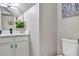 Clean bathroom featuring a vanity with a white countertop and a toilet at 716 Golfview St, Orlando, FL 32804