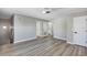 Large bedroom featuring luxury vinyl plank flooring and white trim at 716 Golfview St, Orlando, FL 32804
