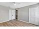 Bedroom with wood floors and double door closet at 716 Golfview St, Orlando, FL 32804