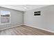 Bedroom featuring natural light, wood-look floors, and a ceiling fan at 716 Golfview St, Orlando, FL 32804