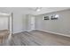 Spacious bedroom featuring modern flooring, and a big window at 716 Golfview St, Orlando, FL 32804