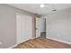 Bright bedroom with vinyl flooring, large closets, and a ceiling fan at 716 Golfview St, Orlando, FL 32804