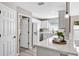 Modern kitchen with white cabinets, stainless appliances, and a view of the bedroom at 716 Golfview St, Orlando, FL 32804