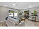 Cozy living room with comfortable seating and a sliding glass door that provides natural light at 716 Golfview St, Orlando, FL 32804