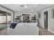 Inviting living room with a plush sofa, leafy plants, and neutral tones creates a relaxing atmosphere at 716 Golfview St, Orlando, FL 32804