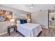 Inviting main bedroom featuring serene decor, a ceiling fan and side tables at 716 Golfview St, Orlando, FL 32804