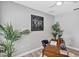 Cozy home office features wood desk, stylish decor, and ample natural light at 716 Golfview St, Orlando, FL 32804