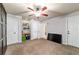Spacious bedroom with closet and ceiling fan, offering ample storage and natural light at 5005 Se 47Th Terrace Rd, Ocala, FL 34480