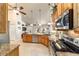 Stylish kitchen showcases modern appliances, granite countertops, and seamless flow to living spaces at 5005 Se 47Th Terrace Rd, Ocala, FL 34480