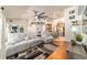 Inviting living room featuring plush seating and an open layout leading to the kitchen at 5005 Se 47Th Terrace Rd, Ocala, FL 34480