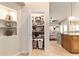 Walk-in pantry providing ample shelving for storing all your favorite snacks and ingredients at 5005 Se 47Th Terrace Rd, Ocala, FL 34480
