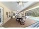 Enjoy outdoor living with views of pool and dining area in covered lanai at 5005 Se 47Th Terrace Rd, Ocala, FL 34480