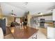 Open concept living space featuring dining area, kitchen, and living room at 680 Nw 67Th Pl, Ocala, FL 34475