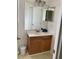 Cozy bathroom featuring a vanity with a wooden cabinet and a mirror at 2233 Ardon Ave, Orlando, FL 32833