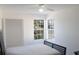 Bedroom with modern bed frame and windows offering natural light and views at 2233 Ardon Ave, Orlando, FL 32833