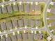 Overhead aerial of house in a residential community showcases a mix of homes at 9478 Sw 52Nd Loop, Ocala, FL 34481