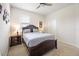 Bedroom with a dark wood furniture set, carpet floors, and a ceiling fan at 9478 Sw 52Nd Loop, Ocala, FL 34481