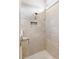Tiled shower with a niche, offering a clean and modern look at 9478 Sw 52Nd Loop, Ocala, FL 34481