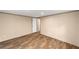 The bedroom features wood-look flooring and neutral walls at 221 Se 167Th Ct, Silver Springs, FL 34488