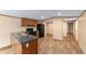 Bright and open kitchen featuring sleek appliances, marble counters, and stylish wood flooring for cooking and entertaining at 221 Se 167Th Ct, Silver Springs, FL 34488
