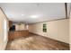 The living room has wood-look floors and large windows for natural light at 221 Se 167Th Ct, Silver Springs, FL 34488