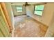 Bedroom with hardwood floors and multiple windows at 3682 Jack Pine Ln, Ormond Beach, FL 32174