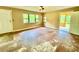 Inviting living room with natural light and access to a porch at 3682 Jack Pine Ln, Ormond Beach, FL 32174