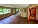 Expansive living room with multiple windows, open layout, and potential for customization at 3682 Jack Pine Ln, Ormond Beach, FL 32174