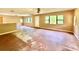 Bright living room featuring natural light, large windows, and hardwood floors at 3682 Jack Pine Ln, Ormond Beach, FL 32174