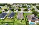 A neighborhood aerial view showcasing the property and the beautifully landscaped lawns, with well-maintained homes at 3940 Se 5Th Ave, Ocala, FL 34480