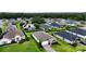 Overhead view of a home's roof and landscaped yard, situated in a well-maintained suburban neighborhood at 3940 Se 5Th Ave, Ocala, FL 34480