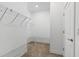 Walk-in closet featuring wire shelving, providing ample storage space in an organized manner at 3940 Se 5Th Ave, Ocala, FL 34480