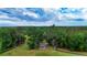 Aerial view of a community gazebo surrounded by lush greenery and winding paths at 3940 Se 5Th Ave, Ocala, FL 34480
