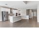 Bright kitchen featuring stainless steel appliances, an island, and a seamless connection to the dining area at 3940 Se 5Th Ave, Ocala, FL 34480