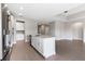 Beautiful kitchen with white cabinetry, an island, modern appliances, and a bright open layout at 3940 Se 5Th Ave, Ocala, FL 34480