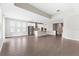 Open floor plan featuring tile floors, large kitchen island with modern stainless steel appliances at 3940 Se 5Th Ave, Ocala, FL 34480