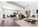 Bright, open-concept living and dining area with modern furnishings and lots of natural light at 3940 Se 5Th Ave, Ocala, FL 34480
