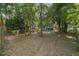 Expansive backyard offers ample space for outdoor activities and serene relaxation at 5881 Avenue H, Mc Intosh, FL 32664