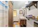Bathroom with a unique sink and open shelving for storage at 5881 Avenue H, Mc Intosh, FL 32664