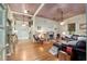 Spacious living room with hardwood floors, fireplace, and stylish furnishings at 5881 Avenue H, Mc Intosh, FL 32664