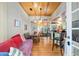 Living room with dining space, hardwood floors and lots of light at 5881 Avenue H, Mc Intosh, FL 32664