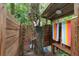 Rustic outdoor shower with wood enclosure, perfect for enjoying nature at 5881 Avenue H, Mc Intosh, FL 32664