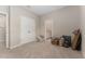 Large bedroom featuring neutral walls and carpet with closet and ensuite bath access at 8123 Sw 57Th Ct, Ocala, FL 34476