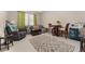 Cozy living room with ample seating and a dining area at 8123 Sw 57Th Ct, Ocala, FL 34476