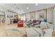 Bright and airy living room, featuring a comfortable sofa and a view of the dining area at 916 Ashmeade Ct, Port Orange, FL 32127