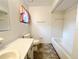 Bathroom featuring a vanity, toilet, and shower with simple fixtures at 11027 Sw 75Th Ave, Ocala, FL 34476