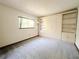 Bedroom with gray carpet and large shelving and cabinet at 11027 Sw 75Th Ave, Ocala, FL 34476