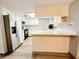 Kitchen with stainless steel appliances, marble counters, and island at 11027 Sw 75Th Ave, Ocala, FL 34476