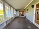 Enclosed back porch overlooking the home's backyard at 11027 Sw 75Th Ave, Ocala, FL 34476