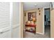 Hallway with console table and view into living space at 487 Midway Dr # B, Ocala, FL 34472